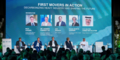 A group of people sitting on the stage of the FMC Panel Session at COP28